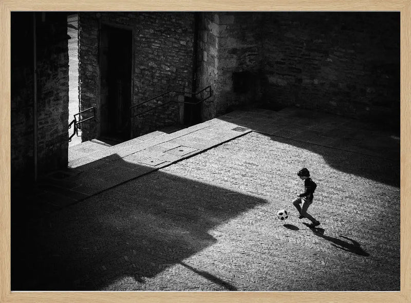 Child playing football - Stretched Canvas, Poster or Fine Art Print I Heart Wall Art